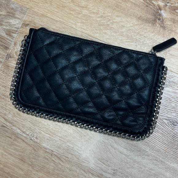 Forever 21 Handbags - Forever 21 soft faux quilted leather with silver metal chain detail. Clutch.